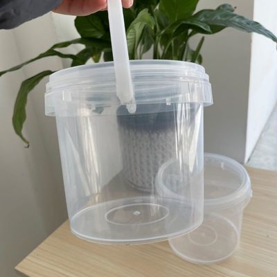 Bouteille ronde de 1000 ml 32 oz contenant un récipient en plastique de qualité alimentaire avec couvercle facile à ouvrir