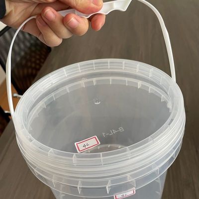 Contenant de crème glacée Seau en plastique de qualité alimentaire avec couvercle et poignée Épaisseur de 1,0 à 2,5 mm