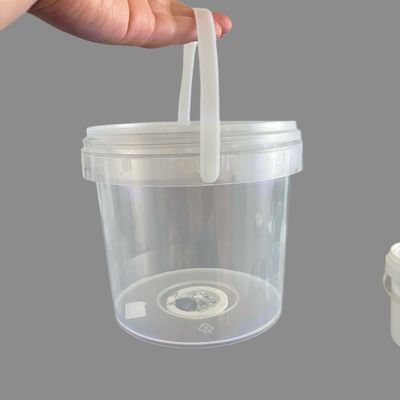 Un seau rond et lumineux pour la sauce, la crème glacée et les biscuits en plastique.